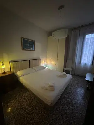 Letto o letti in una camera di Rosa apartment