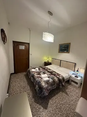Letto o letti in una camera di Rosa apartment