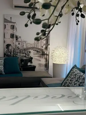 Area soggiorno di Piccola Venezia Apartments