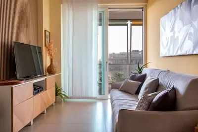 TV o dispositivi per l'intrattenimento presso Jesolo Vista Lido - Family Deluxe Apartment
