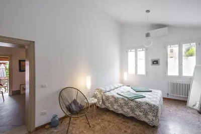 Letto o letti in una camera di Ca' de la Gondola, Murano