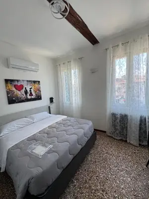 Letto o letti in una camera di Hotel Antico Capon
