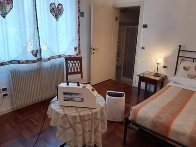 Letto o letti in una camera di Casa del Miele