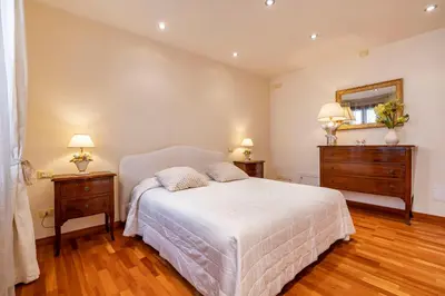 Letto o letti in una camera di Al Campanile View and Terrace by Wonderful Italy