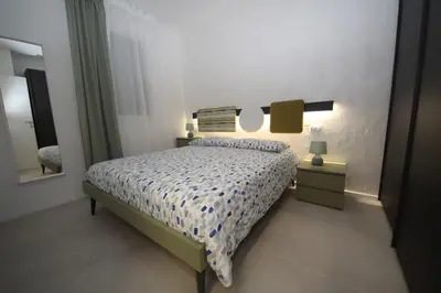 Letto o letti in una camera di Ca' Del Mare