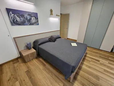 Letto o letti in una camera di appartamento la chiocciola