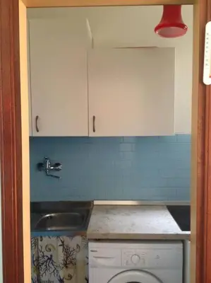 Cucina o angolo cottura di Jesolo Pineta - Appartamento Due Camere Matrimoniali Fronte Mare