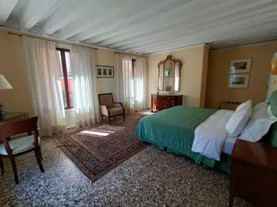 Letto o letti in una camera di Palazzo Querini Accademia