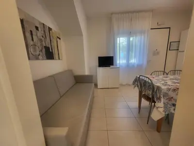TV o dispositivi per l'intrattenimento presso Residence Equilio Family Apartments