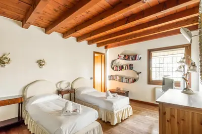 Letto o letti in una camera di GuestHost - Elegant & Superior Scuderia Villa Molin