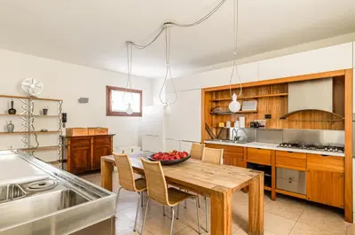 Cucina o angolo cottura di GuestHost - Elegant & Superior Scuderia Villa Molin