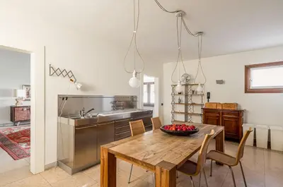 Cucina o angolo cottura di GuestHost - Elegant & Superior Scuderia Villa Molin