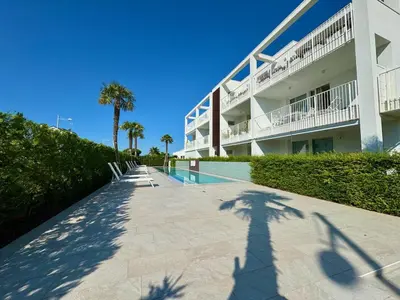 Piscina di H10 - Home Immobiliare Jesolo o nelle vicinanze