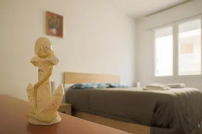 Letto o letti in una camera di [Blu Kobler] - Ampio appartamento fronte mare