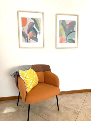 Area soggiorno di enJoy Home - Appartamento ampio, luminoso e immerso nel verde