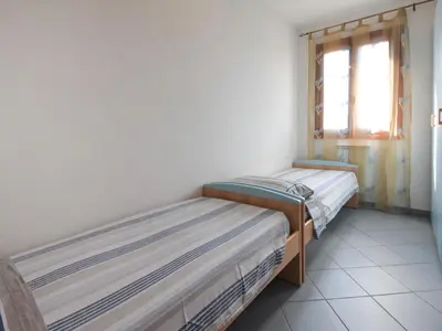 Letto o letti in una camera di Apartment Solmare-4 by Interhome