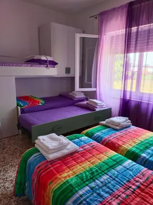 Letto o letti in una camera di Casa da Fiorella