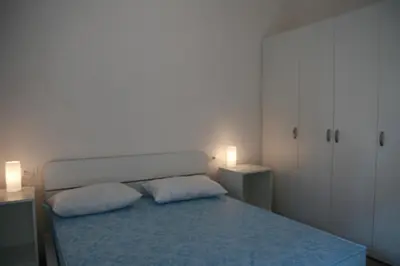 Letto o letti in una camera di Villaggio Solveig Family Apartments