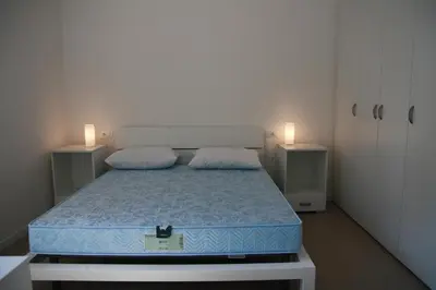 Letto o letti in una camera di Villaggio Solveig Family Apartments