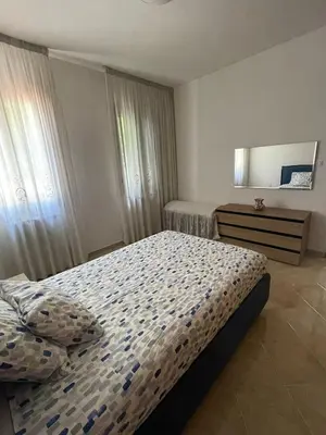 Letto o letti in una camera di A Casa dei Nonni