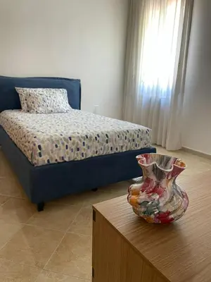 Letto o letti in una camera di A Casa dei Nonni