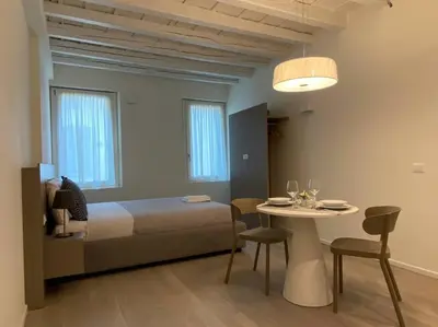 Area soggiorno di Residenza SubitoSanto - Appartamento 1A Ruzzante