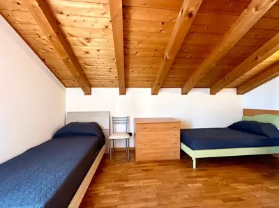 Area soggiorno di Ginevra - Carraro Immobiliare - Family Apartments