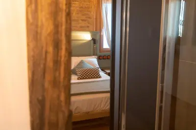 Letto o letti in una camera di Corte Lusenzo