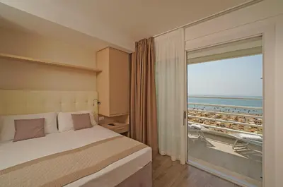 Letto o letti in una camera di Hotel Strand a frontemare