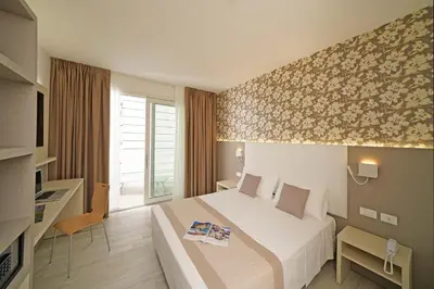 Letto o letti in una camera di Hotel Strand a frontemare