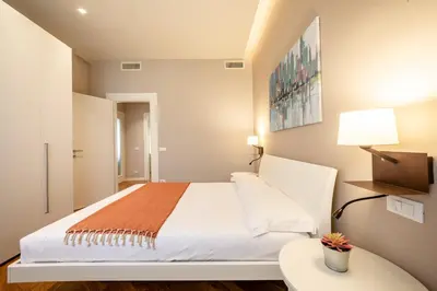 Letto o letti in una camera di San Michele Modern Apartment - con balcone!