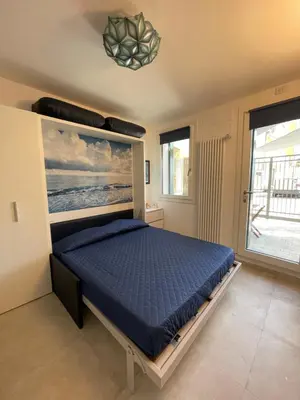 Letto o letti in una camera di Le Vele Luxury Mini Apartment