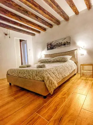 Letto o letti in una camera di Suite Primo Piano