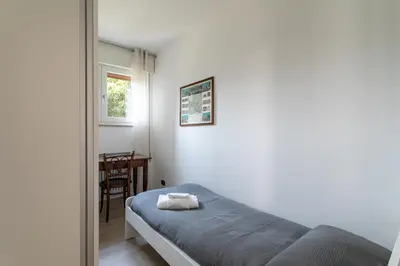 Letto o letti in una camera di Casetta della Margherita - Vicenza san Paolo