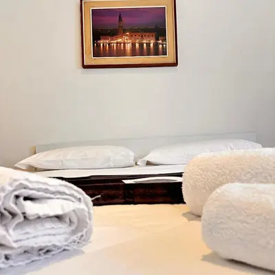 Letto o letti in una camera di Casa Luna