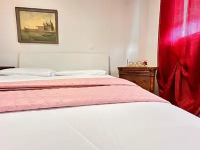 Letto o letti in una camera di Casa Luna