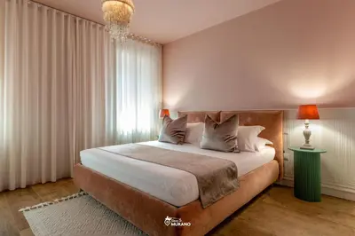 Letto o letti in una camera di MISTRO House by Sleep in MURANO