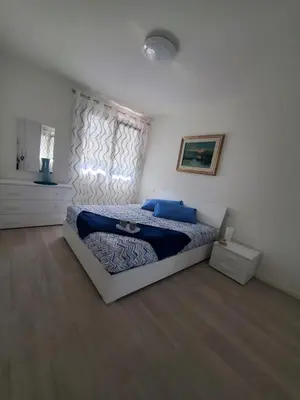 Letto o letti in una camera di Sogno di mare