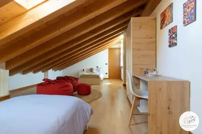 Letto o letti in una camera di Casa L'arte della Vigna