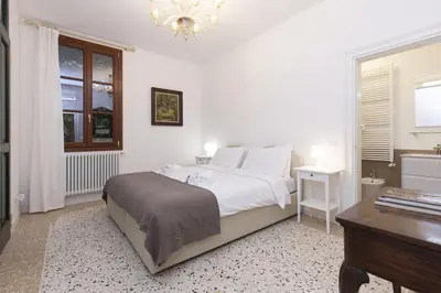 Letto o letti in una camera di Residence Santa Marta by Halldis