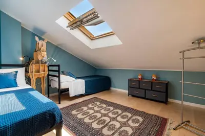Letto o letti in una camera di enJoyHome - Appartamento di pregio con garage