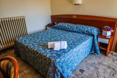 Letto o letti in una camera di Easy Hotel Meryon