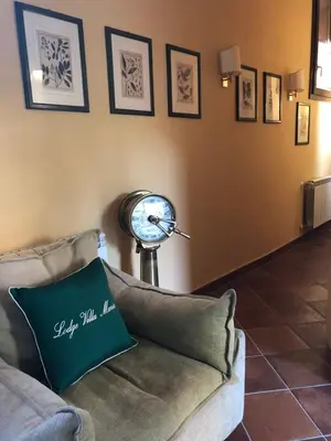 Area soggiorno di Lodge Villa Maria