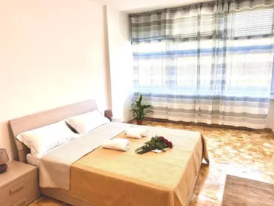 Letto o letti in una camera di Happy Stay