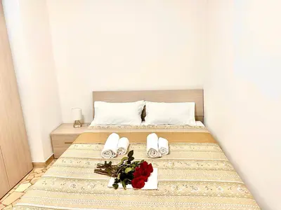 Letto o letti in una camera di Happy Stay