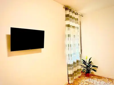 TV o dispositivi per l'intrattenimento presso Happy Stay