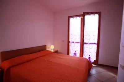 Letto o letti in una camera di Apartment in Rosolina Mare 44965