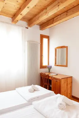 Letto o letti in una camera di Locanda 77