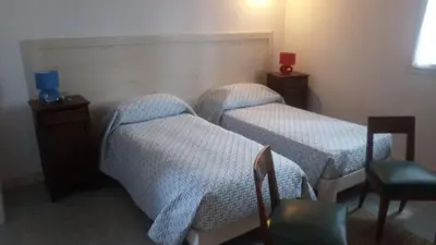 Letto o letti in una camera di Bed & Breakfast DA BARTAI