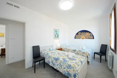 Letto o letti in una camera di DolceVita Apartments N 515 Redentore